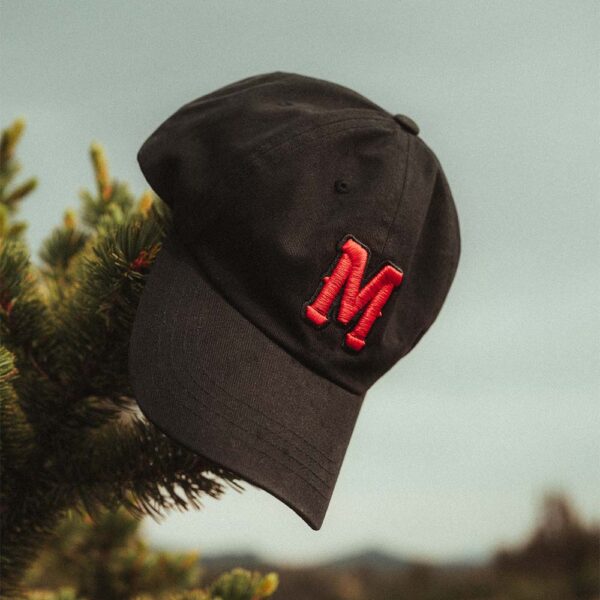 The Monogram Operator Cap front profile with puff-embroidered M